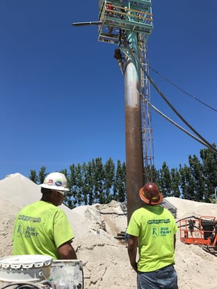 MSHA certified contractors from Roe Paint working outside a mine