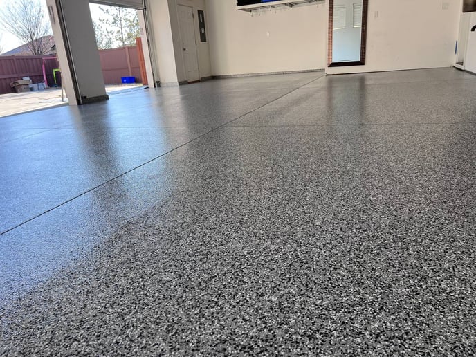 completed topcoat of a residential garage floor coating installation