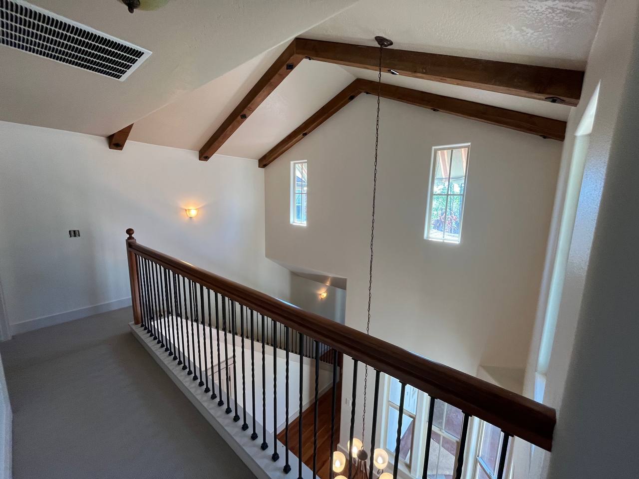 Residential Interior Painting of a Large Home with beams on the ceiling